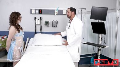 Glasses-wearing Leana Lovings gets a checkup at the doctor's