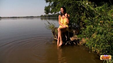 Brunette beauty Erika's blowjob by the lake